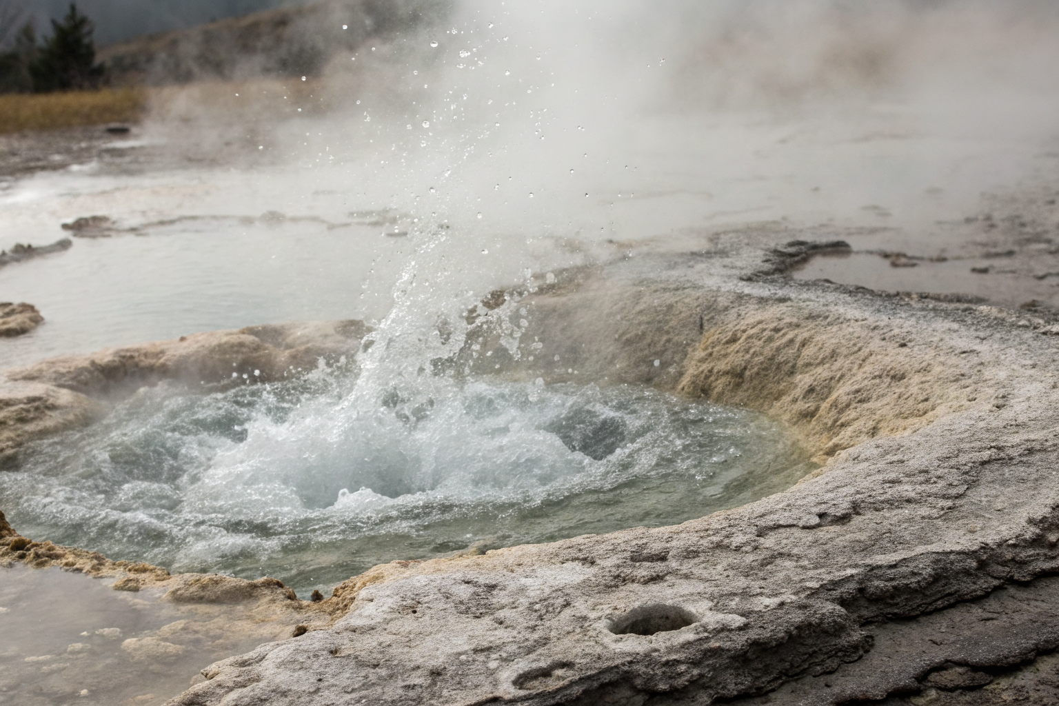 Bubbling well water releasing hydrogen sulfide gas.