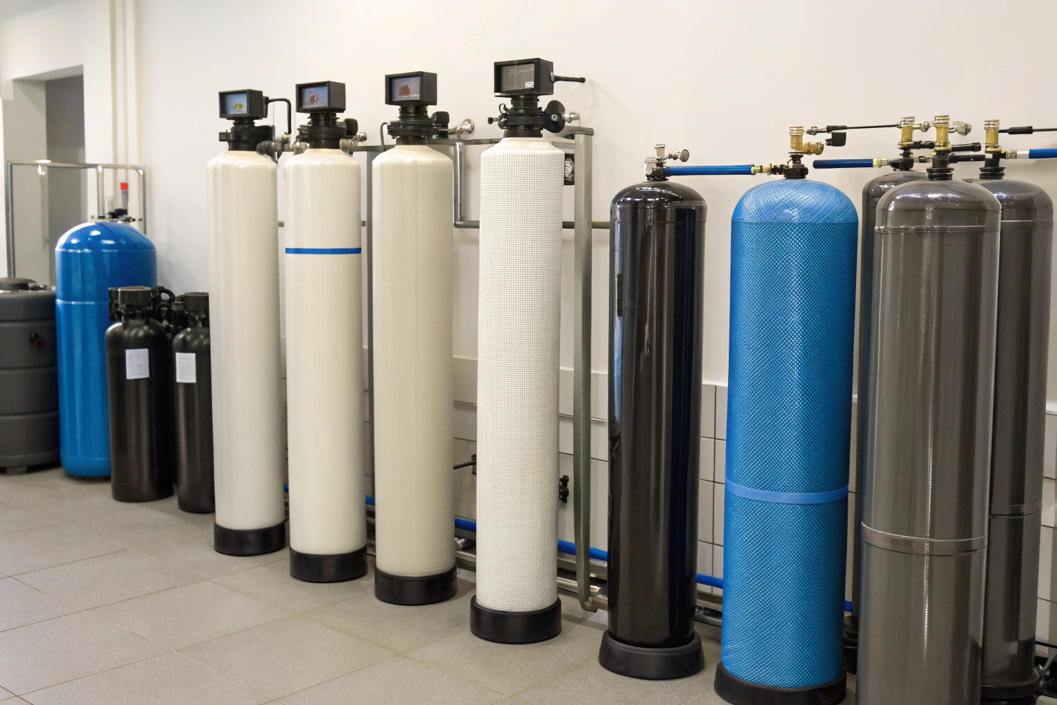 Various well water treatment systems in a showroom environment.