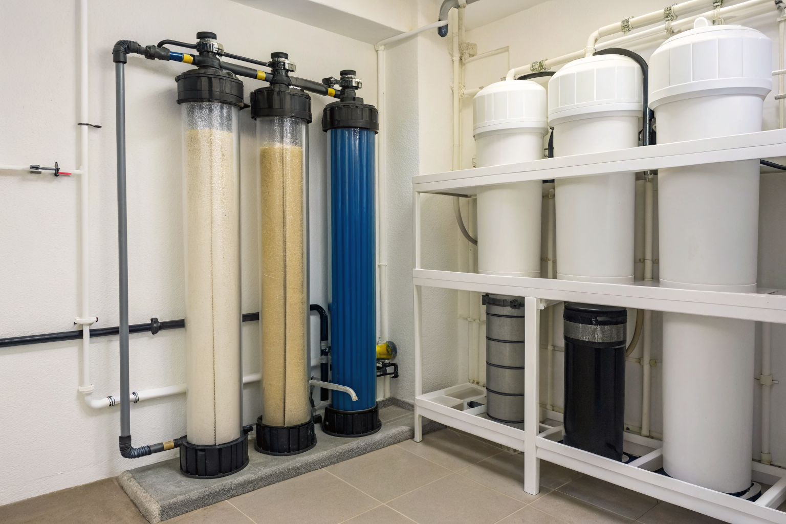 Neutralizing filter with calcite and corosex media in utility room.