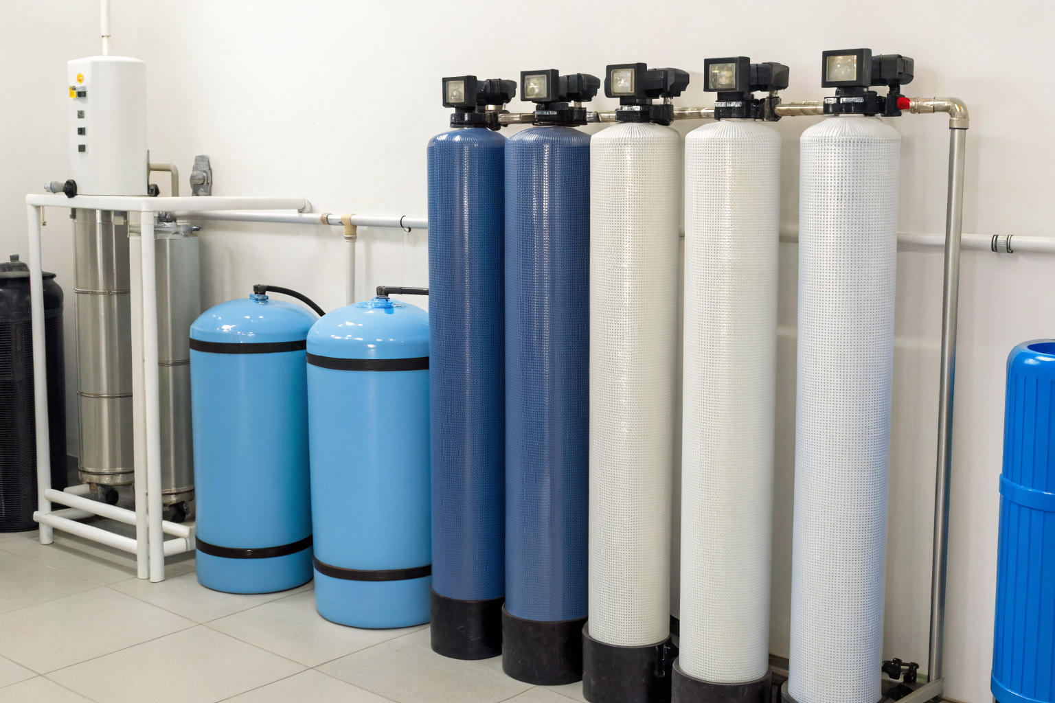Aeration and filtration units in a showroom for water treatment.